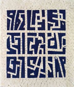 the words are made out of blue and white tiles