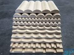 several pieces of wood are stacked on top of each other in order to form a pattern