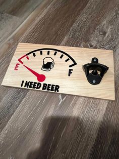 a wooden sign that says i need beer on it with a gauge in the middle