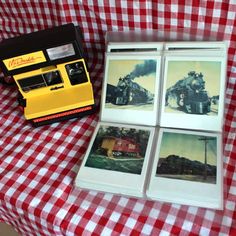 four polaroid pictures sitting on top of a red and white checkered table cloth