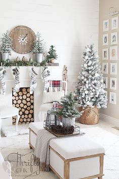 a living room filled with furniture and christmas decorations