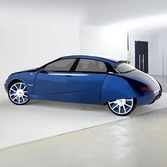 a blue car is parked in a room with white walls and flooring on the ground