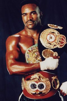 an image of a professional wrestler posing for a photo with his arms crossed and the words envader hoyfield on it