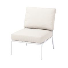 a white chair with a cushion on it