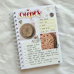 a recipe book is open on top of a white sheet with pictures and words in it