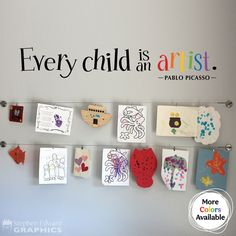 there is a sign on the wall that says every child is an artist and it has many pictures