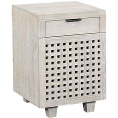 a white wooden cabinet with an open drawer and lattice design on the front, against a white background