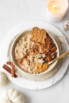 a bowl of oatmeal with cinnamon and pretzels