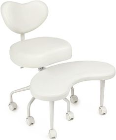 a white chair with wheels and a foot rest