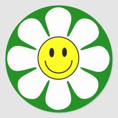 a green and white flower with a smiley face on it's center round sticker