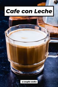 a cup of coffee sitting on top of a counter