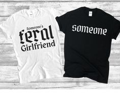 Show off your wild side with this stylish couples shirt set! Featuring bold Gothic fonts, these shirts are perfect for dynamic duos who love to make a statement. Each shirt is sold individually, so you can mix and match to create the perfect pair. Whether you're "Someone's Feral Girlfriend" or just "Someone," these shirts are designed to complement your unique relationship. Perfect for photoshoots, casual outings, or just lounging together. Available in multiple sizes and colors. The unisex soft Cute Couples Shirts Ideas, Matching Couple Shirts Funny, Matching Outfits Couples, Couples Shirts Matching, Couple Shirts Funny, Stylish Couples, Cute Couple Shirts, Funny Couple Shirts, Meme Shirts