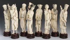 a group of carved ivory figurines