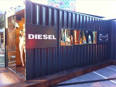 the side of a shipping container that says diesel on it's door and window