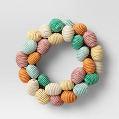 a multicolored wreath made out of shells