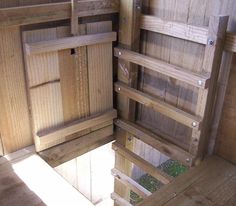 the inside of a wooden building with wood flooring