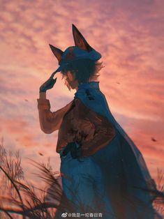 a man dressed as a fox standing in front of a pink and blue sky with clouds