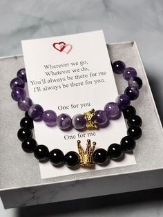 "Matching set of gemstone bracelets for couples, friends, or family Remind yourself of the special relationships you have with those that you adore with these couples/distance bracelets. Each set comes in a complimentary gift box with a note that reads: \"Wherever we go, Whatever we do, You'll always be there for me I'll always be there for you. One for you One for me\" Bracelets are made with 8mm AAA grade quality stone beads and include a magnetic bead to attach to one another  Gold plated King and queen crowns Available in several sizes.  Measure your wrist by wrapping a fabric tape measure around.  The number of inches is the size you want to order Every bracelet is personally hand made by me.  Nothing factory mass produced Find more selections in my shop: essentialjewels2022.etsy.com Couples' Black Promise Bracelets, Black Promise Bracelets For Valentine's Day, Personalized Black Beaded Bracelets For Couples, Black Couples Bracelet Jewelry, Black Bracelet Jewelry For Best Friend Gift, Couples Beaded Bracelets For Valentine's Day, Valentine's Day Black Beaded Bracelet For Best Friend, Black Crystal Bracelet With Gemstone Beads As Gift, Valentine's Day Gift Bracelets With Natural Stones