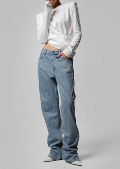 Color: Light Wash Midweight cotton denim Relaxed fit Straight leg Mid-rise Slant hip pockets Back patch pockets Zip fly Front button closure Unlined 100% Cotton Hand Wash in Cold Water By The Frankie Shop. Imported Denim Pants Fashion, Indigo Jeans, Oversized Jeans, The Frankie Shop, Slack Pants, Frankie Shop, Fall Denim, Jeans Light, Cool Street Fashion