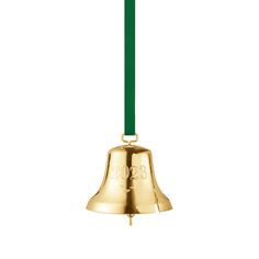 a gold bell with a green ribbon hanging from it's side on a white background