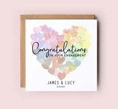 congratulations card with the words congratulations on your engagement written in heart shapes and surrounded by gummy hearts