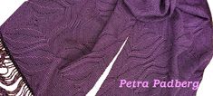 a purple scarf with fringes on it and the words pera padbary