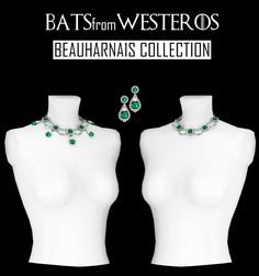 two white mannequins with green jewelry on them