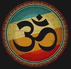 an image of the om shan symbol on a black background with red, yellow and blue stripes