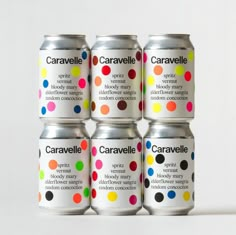 six cans of caravelle are stacked on top of each other with colorful polka dots