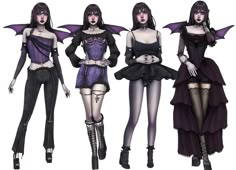 three women dressed in gothic clothing with bats on their wings