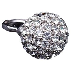 Elevate your evening attire with the Kenneth J Lane Disco Ball cocktail ring. This exquisite piece features a dazzling display of pave-set crystals that catch the light from every angle, reminiscent of a shimmering disco ball. Crafted in a sleek silver tone, the ring’s bold design makes a statement while maintaining an air of sophistication and elegance. Perfect for cocktail parties or any special occasion, this ring is sure to turn heads and spark conversations. Add a touch of glamour to your j Disco Ball Cocktail, Les Angles, Cocktail Parties, Kenneth Jay Lane, Timeless Accessories, Evening Attire, Disco Ball, Cocktail Ring, Ring Silver