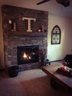 a living room with a fire place in it