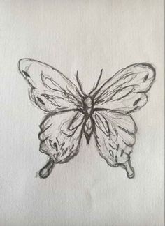 a drawing of a butterfly on white paper with black and gray ink, it looks like the