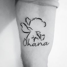 a small black and white photo of a woman's foot with the word shana on it