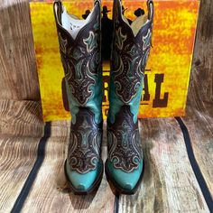 Corral Distressed Turquoise Boot - G1184 A Dash Of Color And An Intricately Embroidered Motif Lends A Feminine Appeal To Your Ensemble When You Don These Supple Leather Boots In Distressed Turquoise. 2'' Heel 12'' Shaft 14'' Circumference Pull-On Snip Toe Full Grain Leather Upper Leather Lining Leather Sole Made In Mexico Western Turquoise Boots With Patina, Turquoise Western Boots With Snip Toe, Turquoise Western Boots With Patina, Western Turquoise Boots For Rodeo, Turquoise Patina Boots With Round Toe, Turquoise Western Boots For Ranch, Fitted Turquoise Boots For Ranch, Turquoise Leather Boots For Western-themed Events, Green Western Boots For Rodeo