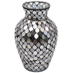 a black and white mosaic vase on a white background