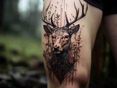 a deer with antlers on it's legs is seen in this tattoo design