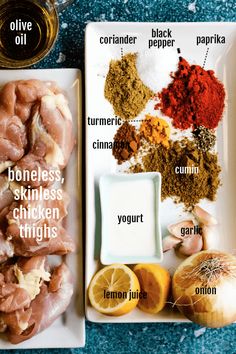 ingredients to make chicken thighs on a white plate