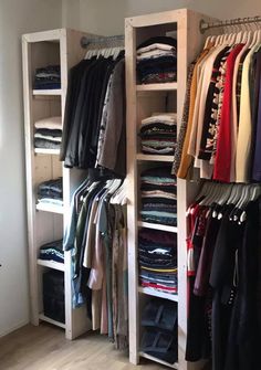 the closet is full of clothes and pants