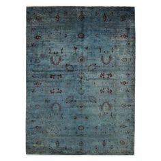 an antique rug with blue and red colors