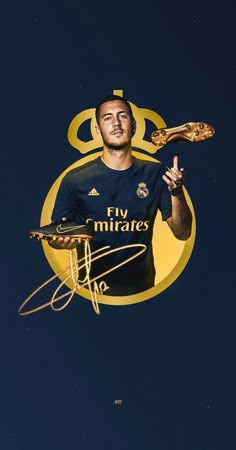 a man holding a soccer ball in his right hand and signed autograph on the other