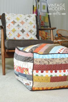 a chair and ottoman made out of old quilts