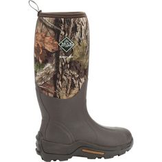 The Woody Max by Muck Boot is a hunter's must have boot. An aggressive lightweight MS-1 molded outsole outsole paired with waterproof construction prepares you for the elements. This 17-inch boot with fleece lining has 5mm of insulating Neoprene, an EVA footbed and a 2mm of thermal foam underfoot to keep you comfortable. Pick up your pair of these boots in Mossy Oak camo pattern today. Farm Boots, Mens Hunting Boots, Boot Stand, Mossy Oak Camo, Country Boots, Boot Companies, Hunting Boots, Muck Boots, Warm Boots