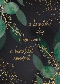 a beautiful day begins with a beautiful mindset - motivational quote on green leaves and gold stars