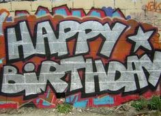 graffiti on the side of a wall that says happy birthday