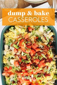 a casserole dish with tomatoes, broccoli and cheese in it on a table