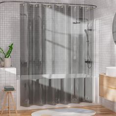 a bathroom with a shower, sink and mirror