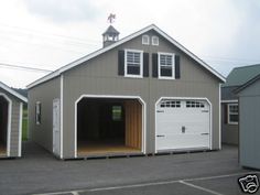 two garages with one open and the other closed