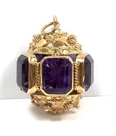 Antique 18k Gold Etruscan Revival Pendant 23.75ct Amethysts Filigree Work 16gr Formal Purple Cabochon Gemstones, Luxury Hallmarked Amethyst Collectible Ring, Luxury Purple Jewelry For Collectors, Antique Amethyst Jewelry Stamped 14k, Luxury Amethyst Jewelry Stamped 14k, Luxury 14k Stamped Amethyst Jewelry, Heirloom Amethyst Jewelry For Formal Occasions, Formal Yellow Gold Faceted Gemstones, Purple 14k Stamped Collectible Jewelry