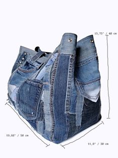 an old pair of jeans has been turned into a tote bag with multiple pockets